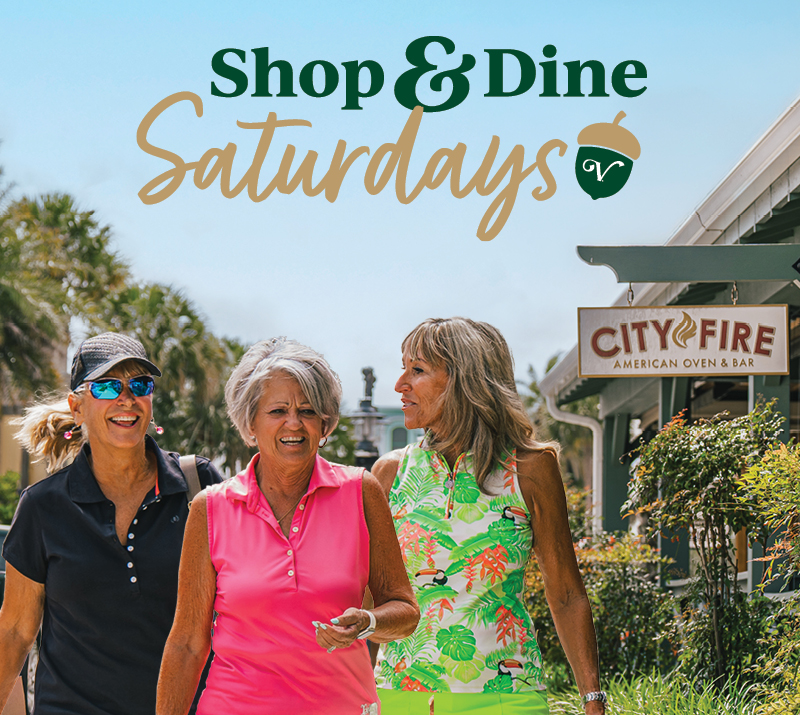 "shop & Dine Saturdays." Three people walk together next to City Fire American Oven & Bar.