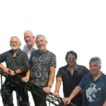 Band Behavior, a band of 5 men, is all smiles as they stand along the black stair railing. Each is wearing a different color or pattern of button-up shirt. The background has been edited to be transparent.