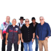 Think Big Band, a group of 6, stand together smiling.
