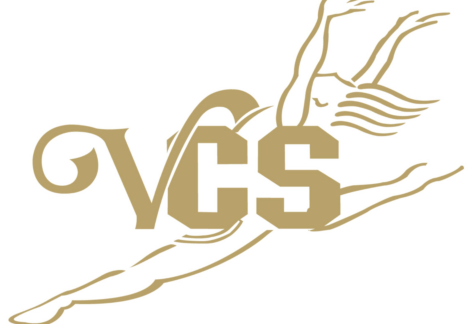 In gold: "VCS" with dancer.