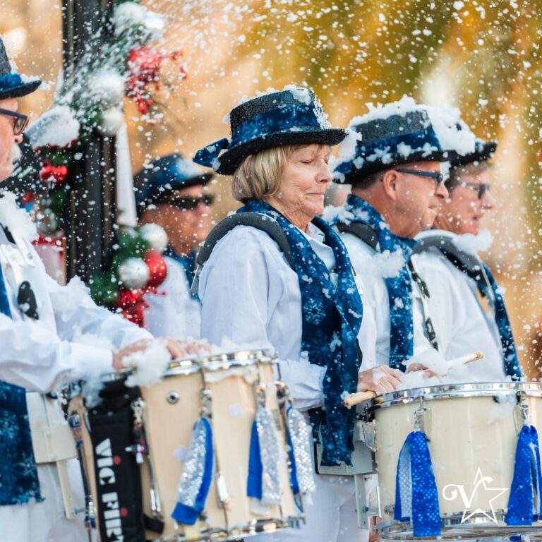 Snow-covered marching band performance