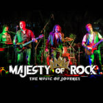 "Majesty of Rock: The Music of Journey" A crown sits atop the word "of." A band of 4 men are performing on a stage, with multicolored lights flooding the stage.