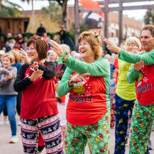 A group of people in festive attire.