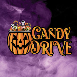 "Candy Drive" A jack-o-lantern bucket containing candy next to orange letters, all atop a purple smoky/foggy background.
