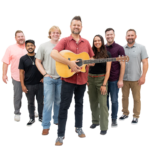 Members of The Brothers Jukebox in a v formation. The lead holds a guitar.