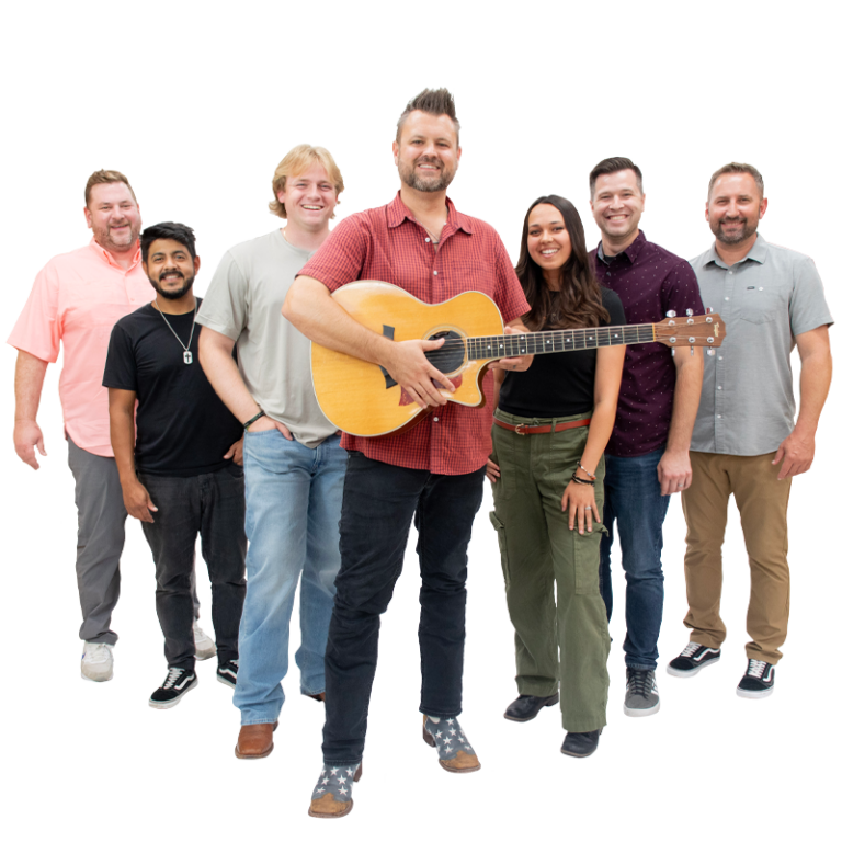 Members of The Brothers Jukebox in a v formation. The lead holds a guitar.