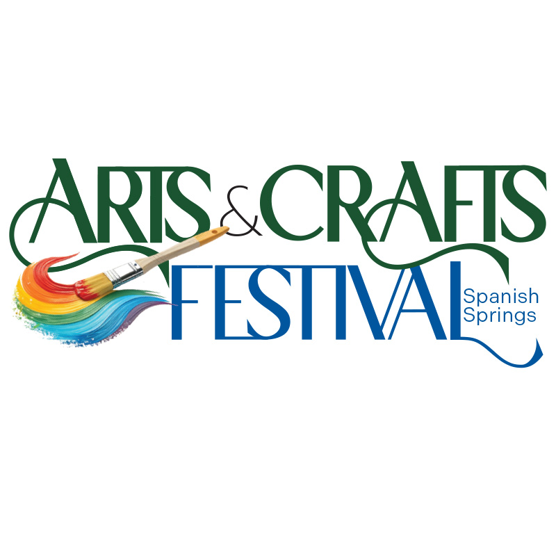 "Arts & Crafts Festival - Spanish Springs." "Arts" and "Crafts" are in green text above "Festival" in blue text. The words are intersected by a paintbrush with rainbow paint. The location is mentioned in blue text next to the word "Festival."