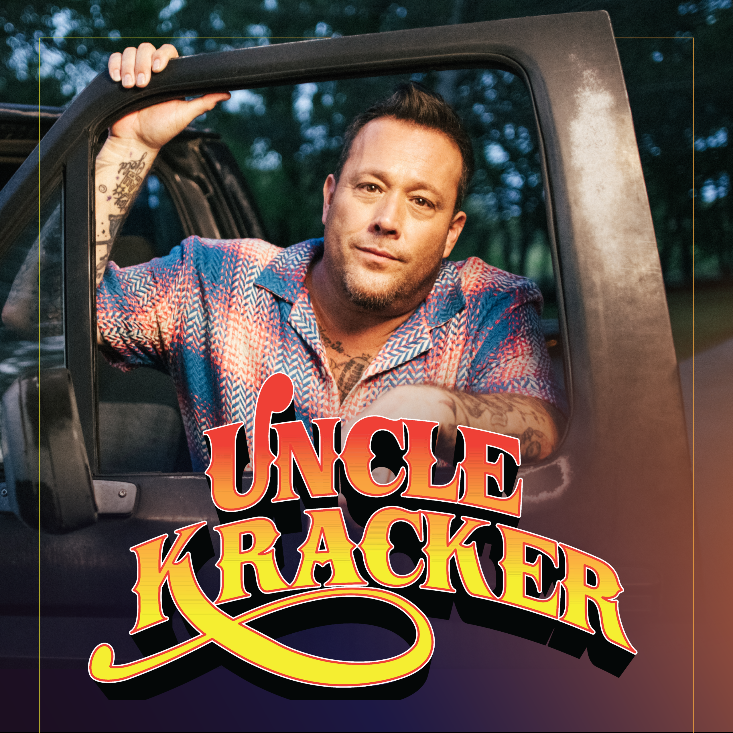 Uncle Kracker posed to the right of his logo reading "Uncle Kracker."
