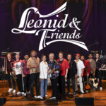 Group of musicians. It reads "Leonid & Friends"