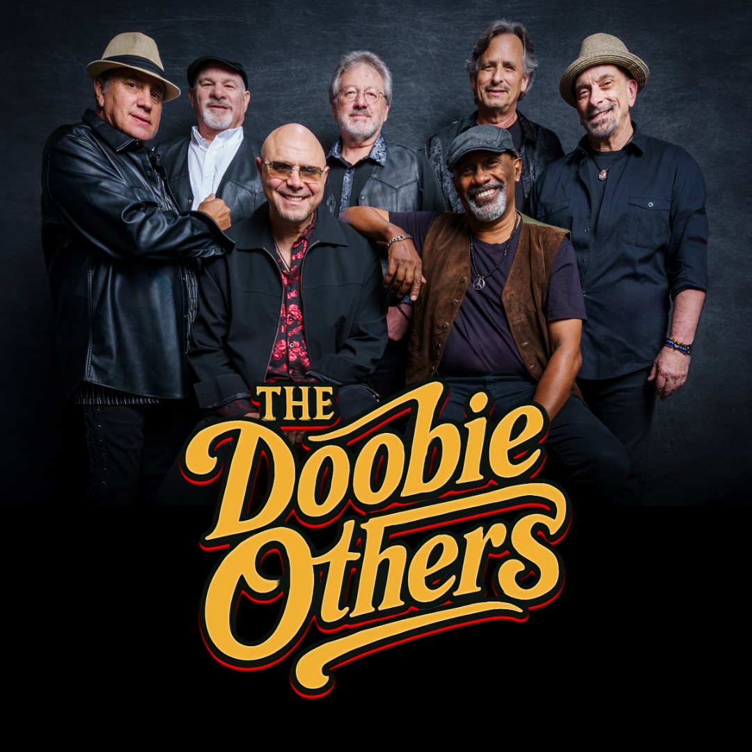 A group of seven performers is posed together against a dark, studio-style background. The performers wear coordinated, classic rock–inspired clothing including leather jackets, vests, button‑down shirts, and hats. The arrangement is layered, with some performers standing and others seated in front, creating a balanced band portrait composition. Centered near the bottom is a large, retro‑styled logo reading “The Doobie Others” in bold yellow and orange lettering with a curved, vintage design.
