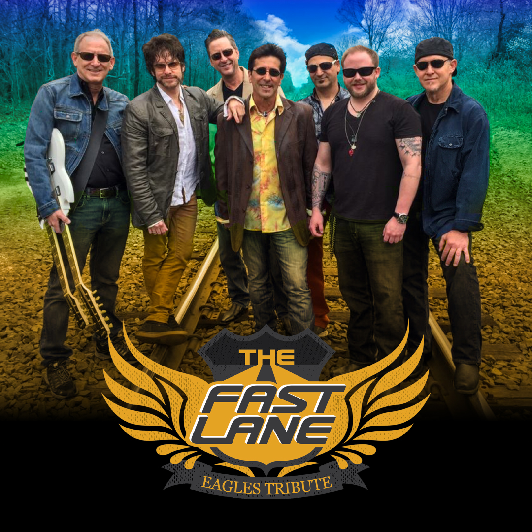 Promotional poster for The Fast Lane - Eagles Tribute. 7 band members are pictured standing on rail road tracks with a green tinted sky behind them. The title is below them overlaying an orange symbol that looks like wings.