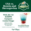 Graphic for a “USA vs. Bosnia and Herzegovina Watch Party” featuring a soccer-themed logo with a flaming soccer ball. Event details read: “Wed, Jul. 1st, 8:00PM, Eastport Center Stage. Bring your chair, cheer and friends! Go Team USA. Weather conditions permitting.” On the right is an image of a red, white, and blue layered drink in a cup labeled “The Villages.” Text below advertises “Featuring Freedom Punch – $8 Single | $10.50 Double.” The Villages logo appears at the bottom.