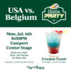 Graphic for a “USA vs. Belgium Watch Party” featuring a soccer-themed logo with a flaming soccer ball. Event details read: “Mon, Jul. 6th, 8:00PM, Eastport Center Stage. Bring your chair, cheer and friends! Go Team USA. Weather conditions permitting.” On the right is an image of a red, white, and blue layered drink in a cup labeled “The Villages.” Text below advertises “Featuring Freedom Punch – $8 Single | $10.50 Double.” The Villages logo appears at the bottom.