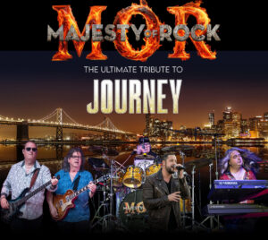 Picture of the band overlaying a city landscape. The title "Majesty Of Rock" is overlaying the letters MOR on fire. "The Ultimate Tribute To Journey" is written in the middle.