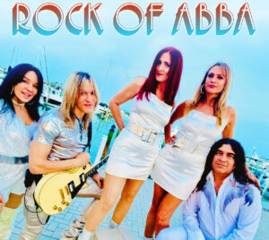 Promotional poster for Rock of ABBA - The Live Celebration. 5 band members are posing in front of water with boats docked around them. The title is written above them.