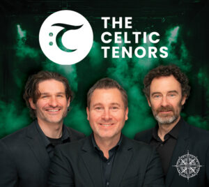 A promotional image with the text “The Celtic Tenors” displayed in white at the top alongside a circular logo to the left. Below, three performers wearing dark suits are pictured from the chest up, standing side by side. The background features a dark stage environment with green lighting and a mist or fog effect. A compass-style graphic appears in the lower right corner.