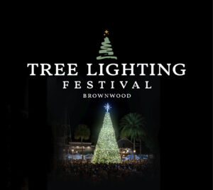 "Tree Lighting Festival - Brownwood" Vignette around a photo of a lit Christmas tree surrounded by people in Brownwood.