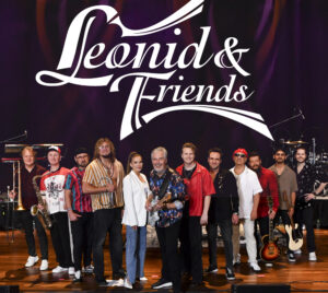 Group of musicians. It reads "Leonid & Friends"